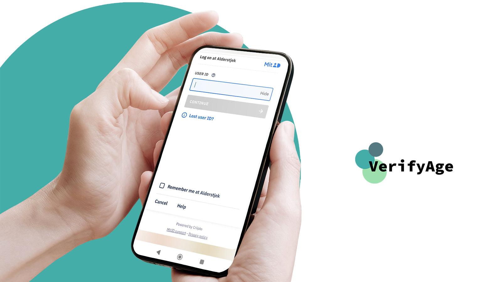 person-holding-phone-and-checking-with-mitid